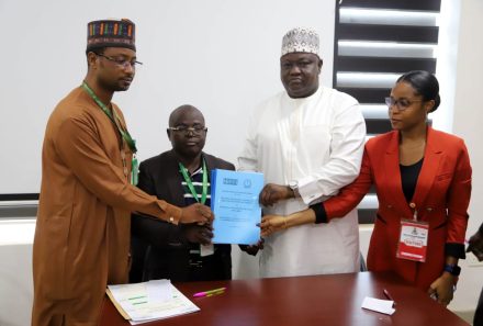 The Deputy Vice-Chancellor, Research and Partnerships, Federal University of Lafia (FULafia), Prof. Samaila Usman Dakyes, signs MoU on behalf of the Vice-Chancellor